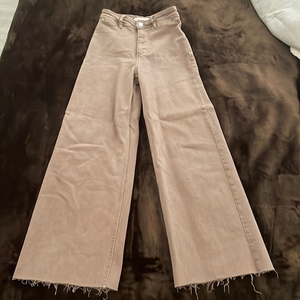 Never worn brown jeans